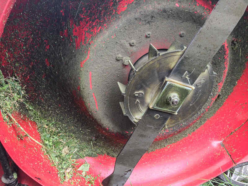 A picture of blade of a red coloured mower
