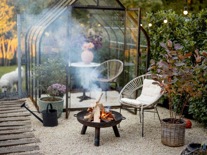backyard garden with fireplace and seating